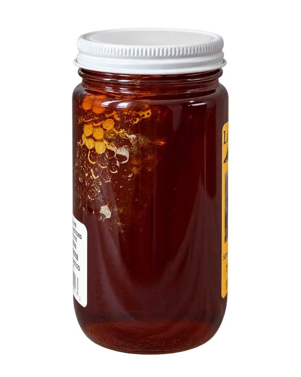 Side view showing natural honeycomb inside Lee's Bees Sourwood Honey